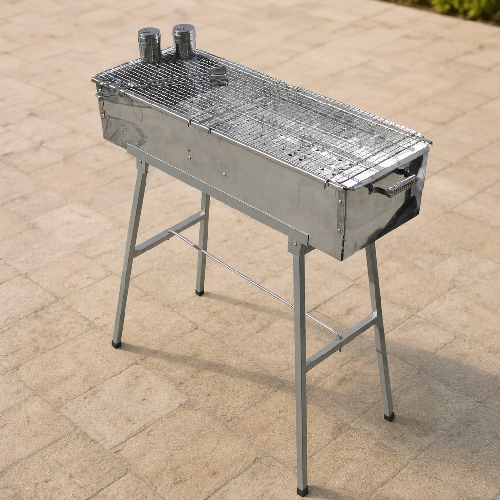 Party Griller 32 inch extra wide stainless steel charcoal grill with stand and two mesh grates on a warm patio-stone background